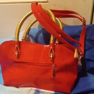 Elegant Red Satchel with Gold Handles